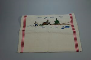 Image of Embroidered dish towel with scene of sledge, 2 Inuit figures, and word 'kitchen'